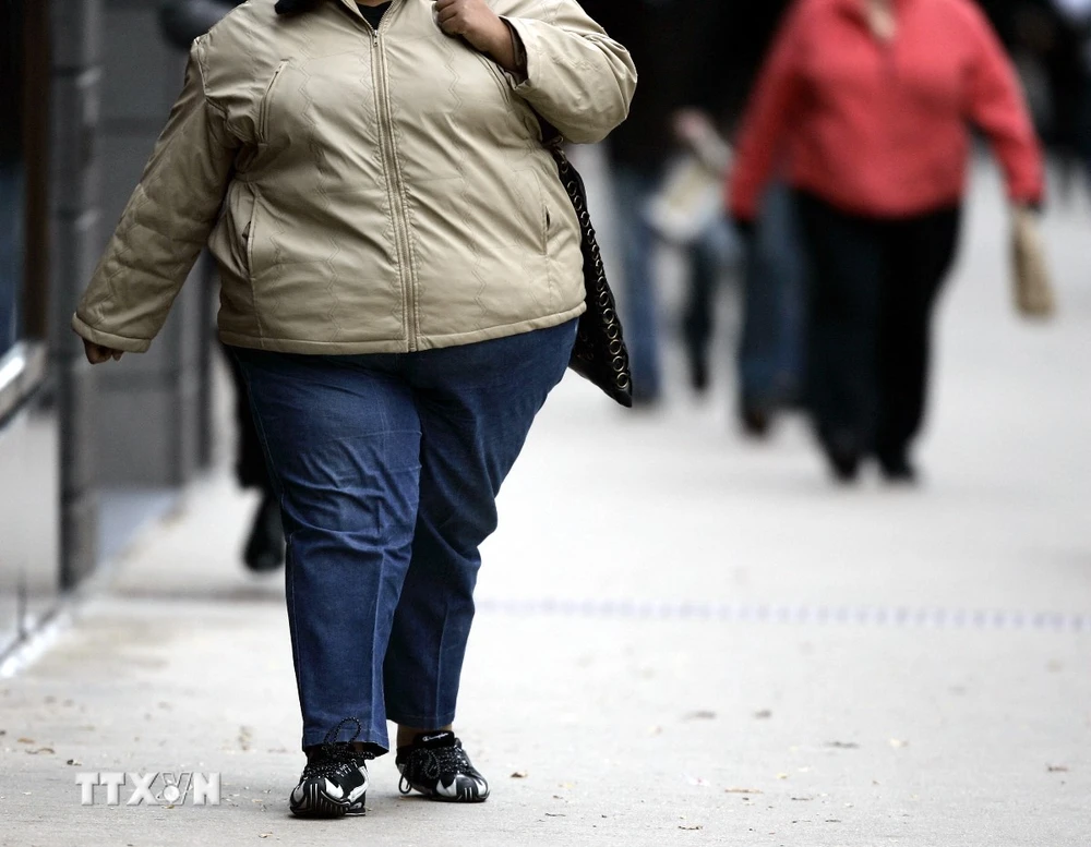 Một phụ nữ bị mắc bệnh béo phì tại Chicago, bang Illinois, Mỹ. (Ảnh: AFP/TTXVN)