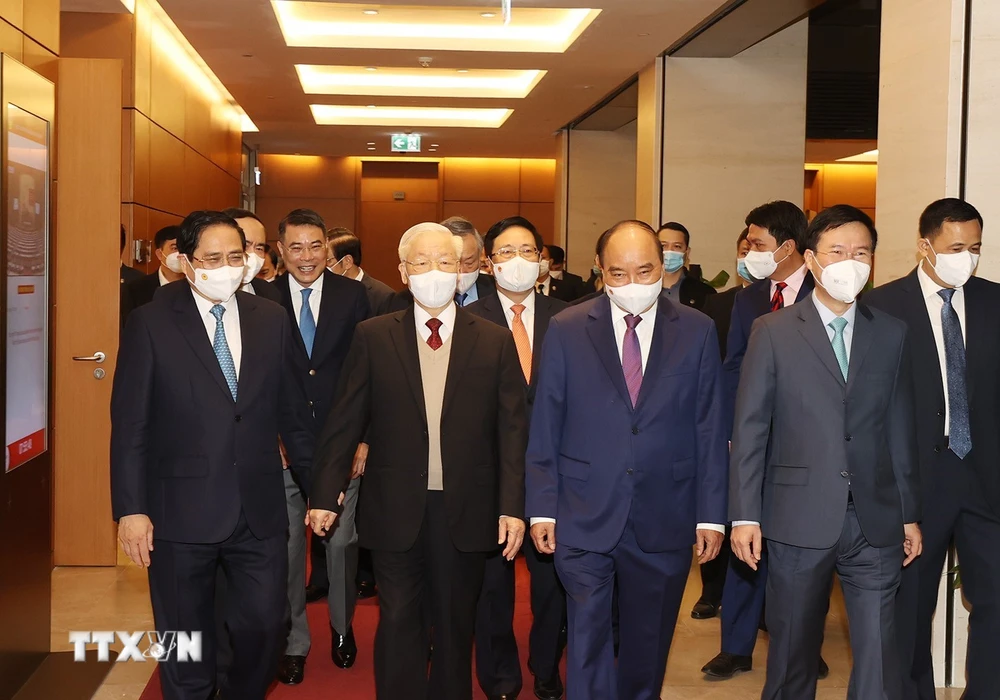Tổng Bí thư Nguyễn Phú Trọng cùng các đồng chí lãnh đạo Đảng, Nhà nước dự hội nghị. (Ảnh: Trí Dũng –TTXVN)