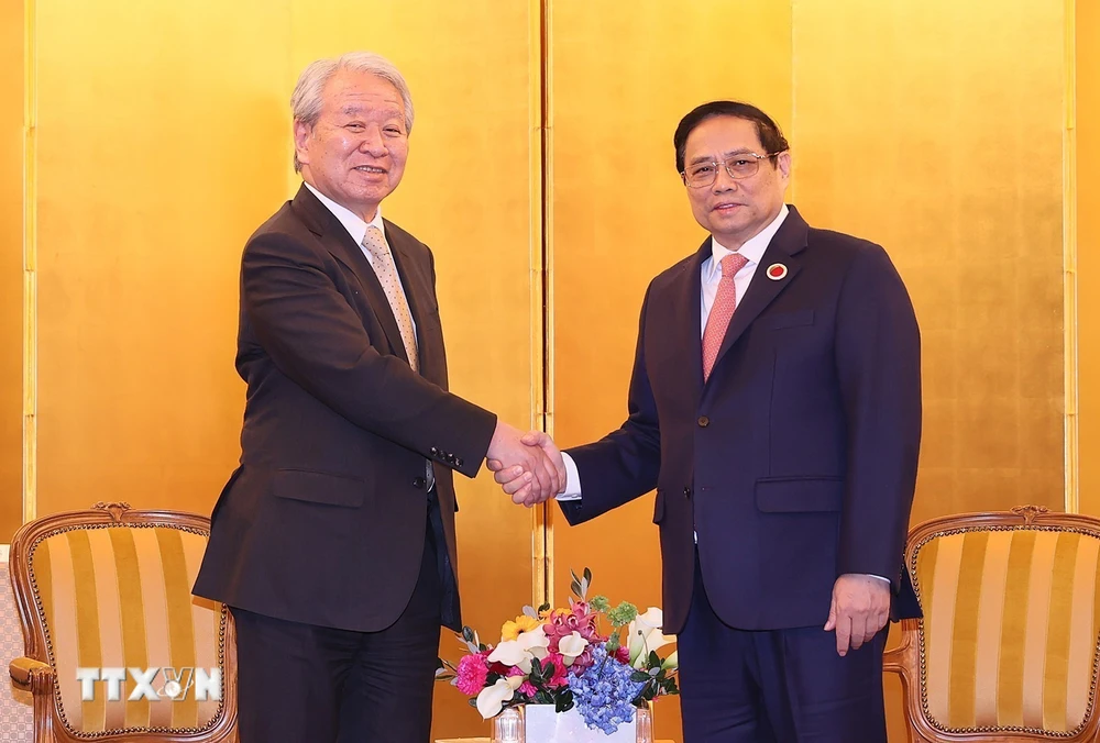 Thủ tướng Phạm Minh Chính tiếp Chủ tịch Cơ quan Hợp tác Quốc tế Nhật Bản Tanaka Akihiko. (Ảnh: Dương Giang/TTXVN)