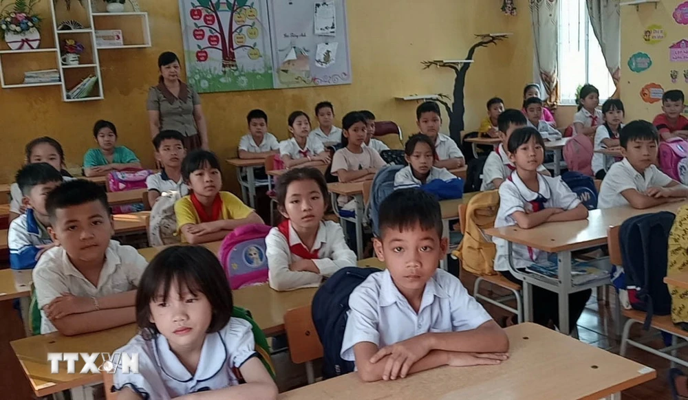 Học sinh Trường Tiểu học Nguyễn Bá Ngọc (thị trấn Triệu Sơn, huyện Triệu Sơn, tỉnh Thanh Hóa) đã đi học trở lại. (Ảnh: TTXVN phát)