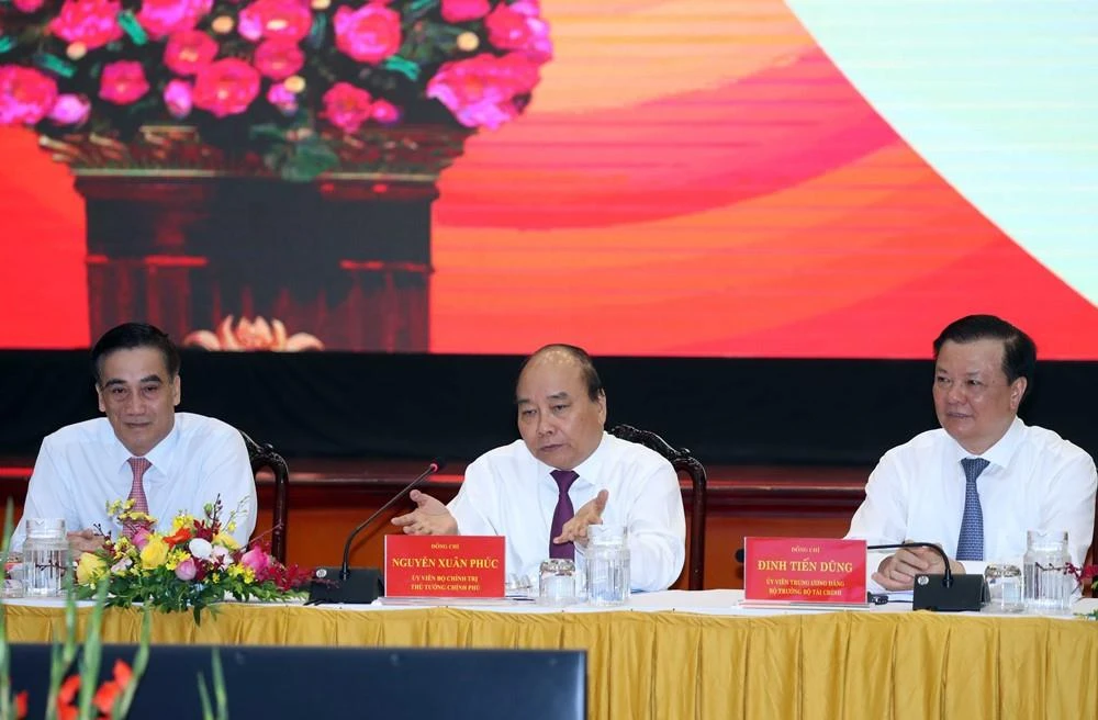 Thủ tướng Nguyễn Xuân Phúc dự Hội nghị sơ kết công tác tài chín, ngân sách Nhà nước 6 tháng đầu năm và triển khai nhiệm vụ 6 tháng cuối năm 2020. (Ảnh: Thống Nhất/TTXVN)