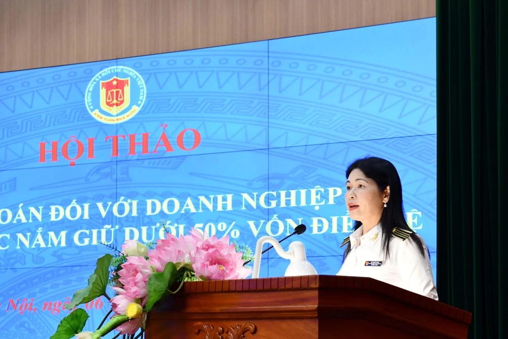 Phó tổng Kiểm toán Nhà nước Hà Thị Mỹ Dung phát biểu tại hội thảo “Kiểm toán đối với doanh nghiệp do Nhà nước nắm giữ dưới 50% vốn điều lệ,” do Kiểm toán Nhà nước tổ chức ngày 6/7. (Ảnh: Vietnam+)