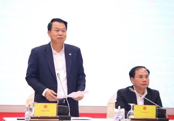 Thứ trưởng Bộ Tài chính Nguyễn Đức Chi trả lời báo chí tại buổi họp báo Chính phủ thường kỳ tháng 11/2022. (Ảnh: Vietnam+)
