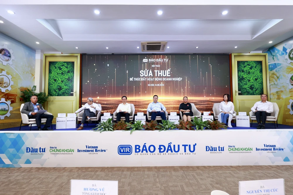 Hội thảo “Sửa thuế để thúc đẩy hoạt động doanh nghiệp,” do báo Đầu tư-Bộ Kế hoạch và Đầu tư tổ chức ngày 14/8. (Ảnh: Vietnam+)