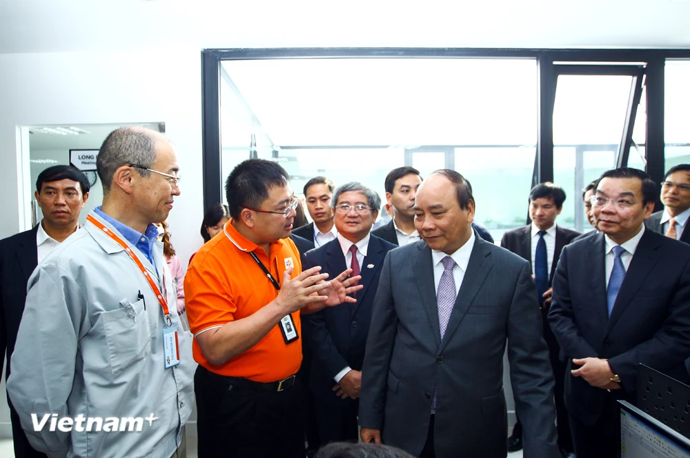 Photo] Thủ tướng Chính phủ thăm làng phần mềm FPT tại Hòa Lạc | Vietnam+  (VietnamPlus)