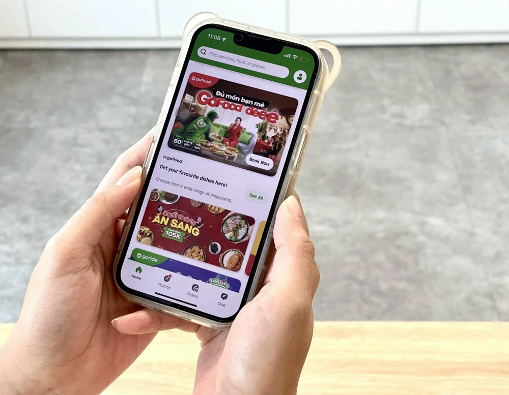 Ứng dụng GoFood của Gojek đã giúp rất nhiều chủ quán ăn tiếp cận gần hơn với người tiêu dùng. (Ảnh: V.C/Vietnam+)