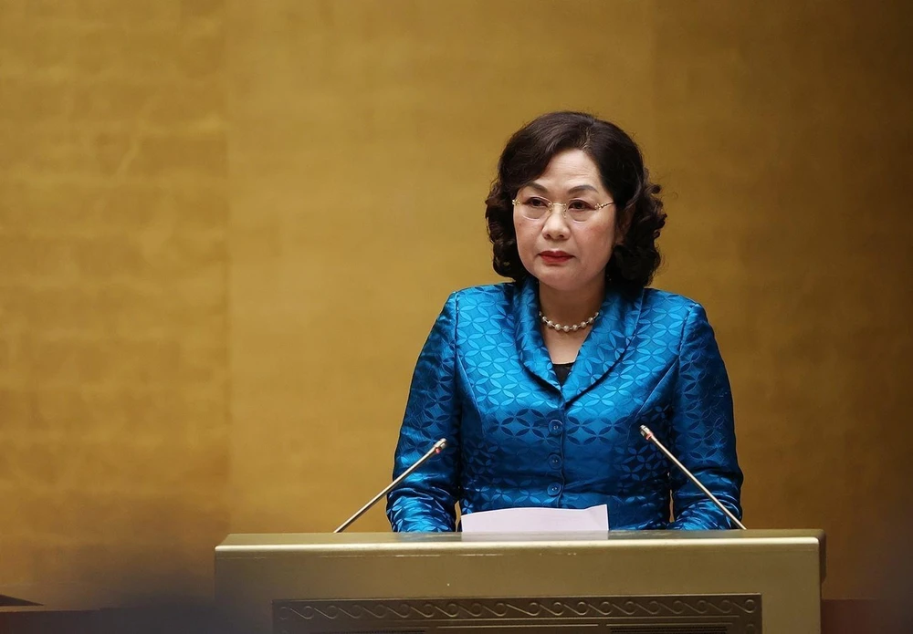 Thống đốc Ngân hàng Nhà nước Việt Nam Nguyễn Thị Hồng trình bày Báo cáo tổng kết. (Ảnh: Dương Giang/TTXVN)