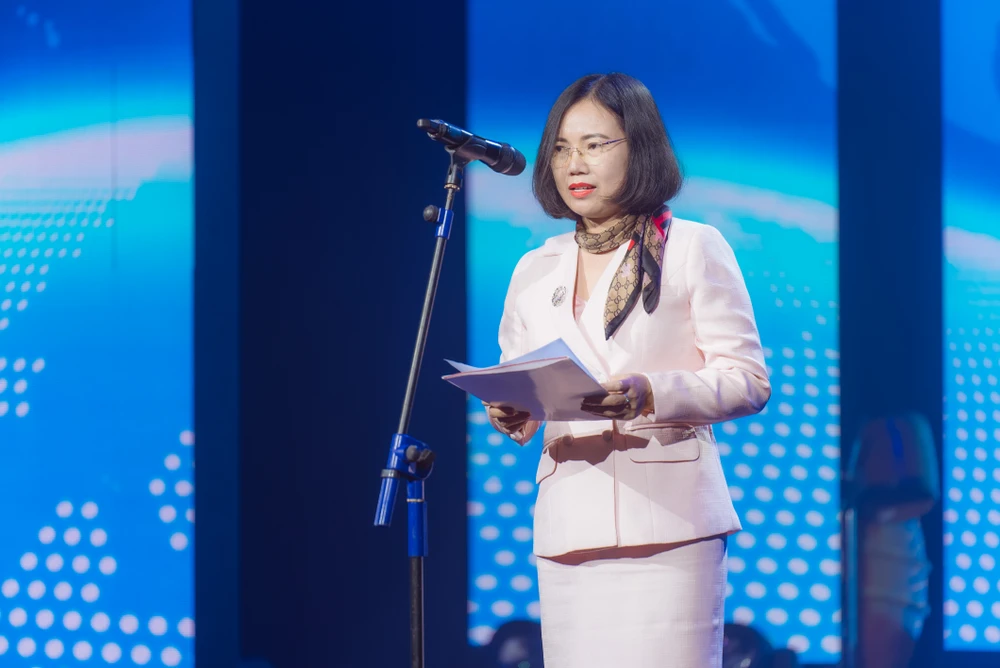 Bà Hoàng Thị Thơm - Phó Cục trưởng Cục Dân số (Bộ Y tế) phát biểu tại buổi Lễ. (Ảnh: PV/Vietnam+)