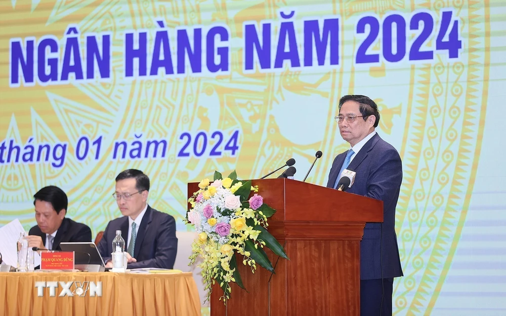 Thủ tướng Phạm Minh Chính phát biểu chỉ đạo tại Hội nghị triển khai nhiệm vụ ngành ngân hàng năm 2024. (Ảnh: Dương Giang/TTXVN)