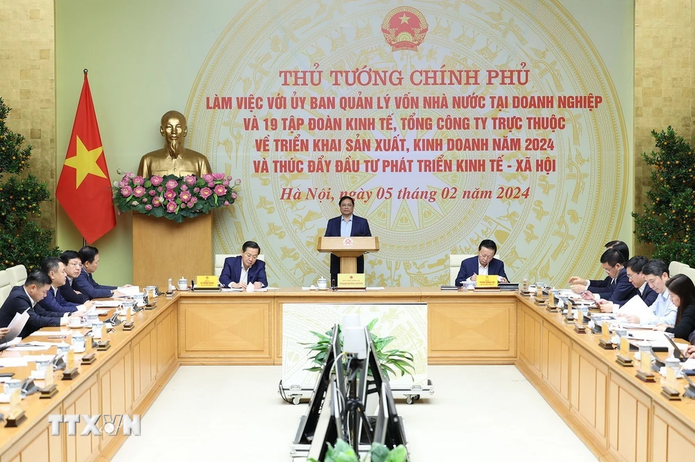 Thủ tướng Phạm Minh Chính làm việc với Uỷ ban Quản lý vốn Nhà nước tại doanh nghiệp và 19 Tập đoàn, Tổng công ty. (Ảnh: Dương Giang/TTXVN)