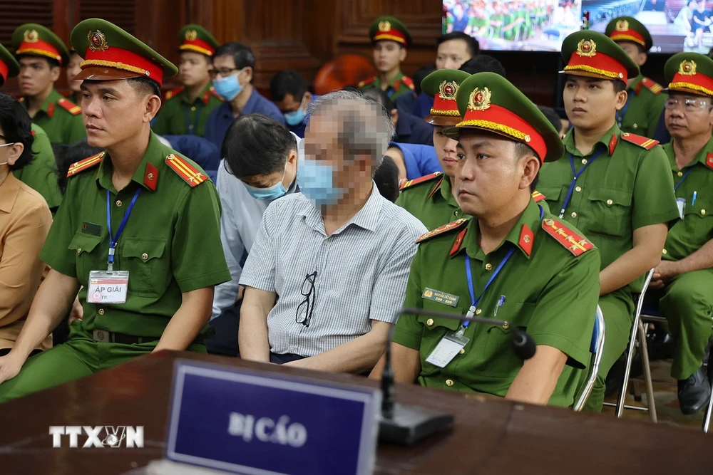 Bị cáo Nguyễn Văn Hưng, cựu Phó Chánh Thanh tra phụ trách Cơ quan Thanh tra, Giám sát Ngân hàng Nhà nước tại phiên tòa ngày 25/3. (Ảnh: Thanh Vũ/TTXVN)