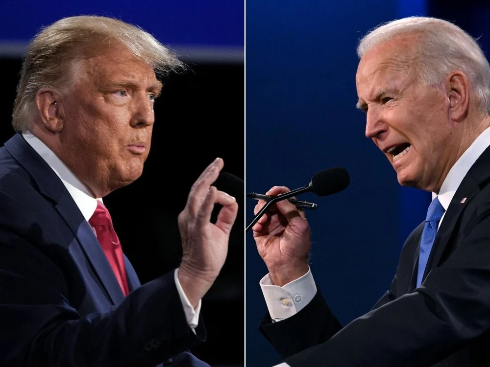 Tổng thống Mỹ Joe Biden (phải) và đối thủ đảng Cộng hòa Donald Trump. (Ảnh: AFP/ TTXVN)