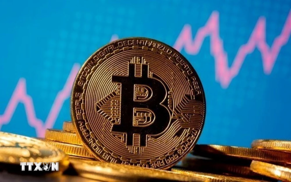 Đồng tiền kỹ thuậ số Bitcoin. (Ảnh: REUTERS/TTXVN)