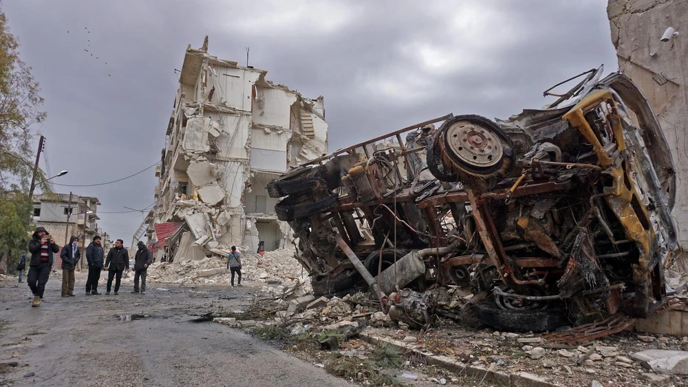 Cảnh đổ nát sau một vụ không kích tại Idlib, tây bắc Syria, ngày 14/3. (Ảnh: AFP/TTXVN)