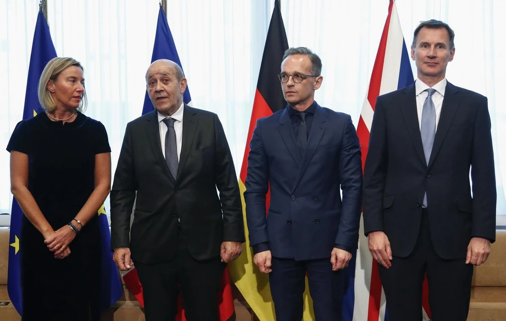 Đại diện cấp cao phụ trách an ninh và đối ngoại của Liên minh châu Âu (EU) Federica Mogherini, Ngoại trưởng Pháp Jean-Yves Le Drian, Ngoại trưởng Đức Heiko Maas và Ngoại trưởng Anh Jeremy Hunt. (Ảnh: AFP/TTXVN)