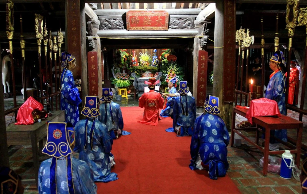Lễ khai chỉ tại lễ hội thu chùa Keo năm 2019. (Ảnh: Thế Duyệt/TTXVN)