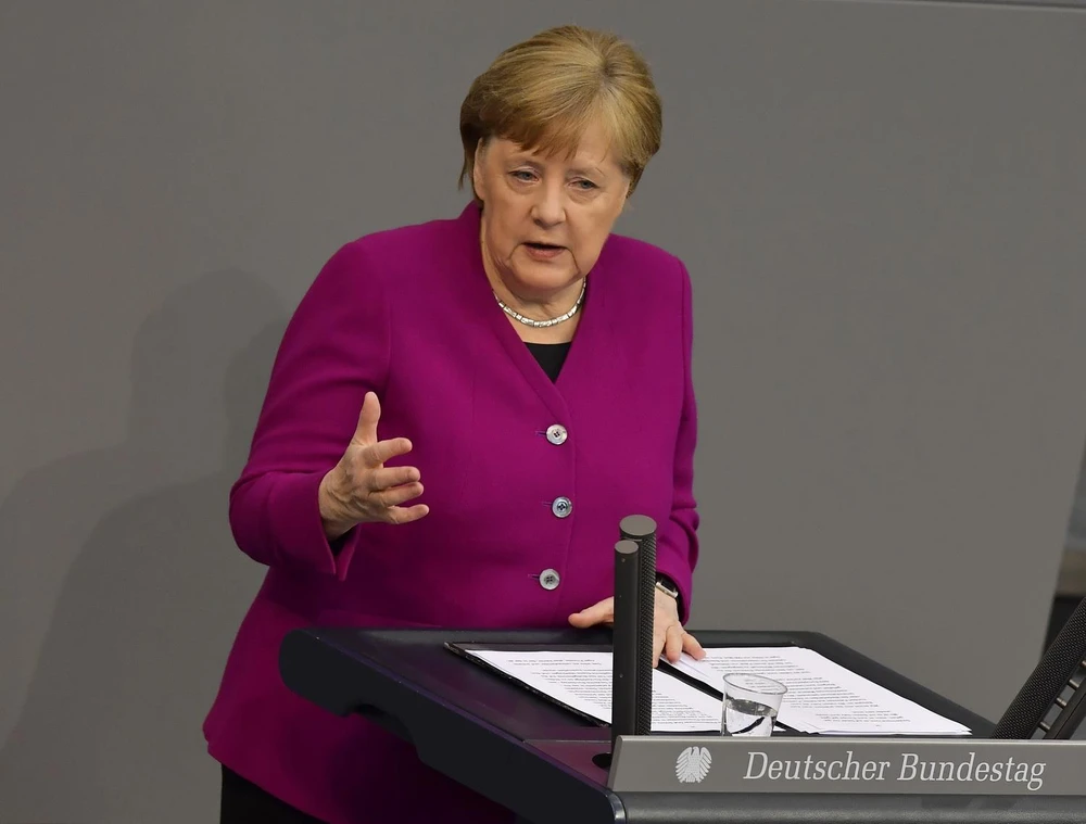Thủ tướng Đức Angela Merkel phát biểu trong cuộc họp dịch về COVID-19 tại Berlin, ngày 23/4. (Ảnh: AFP/TTXVN)