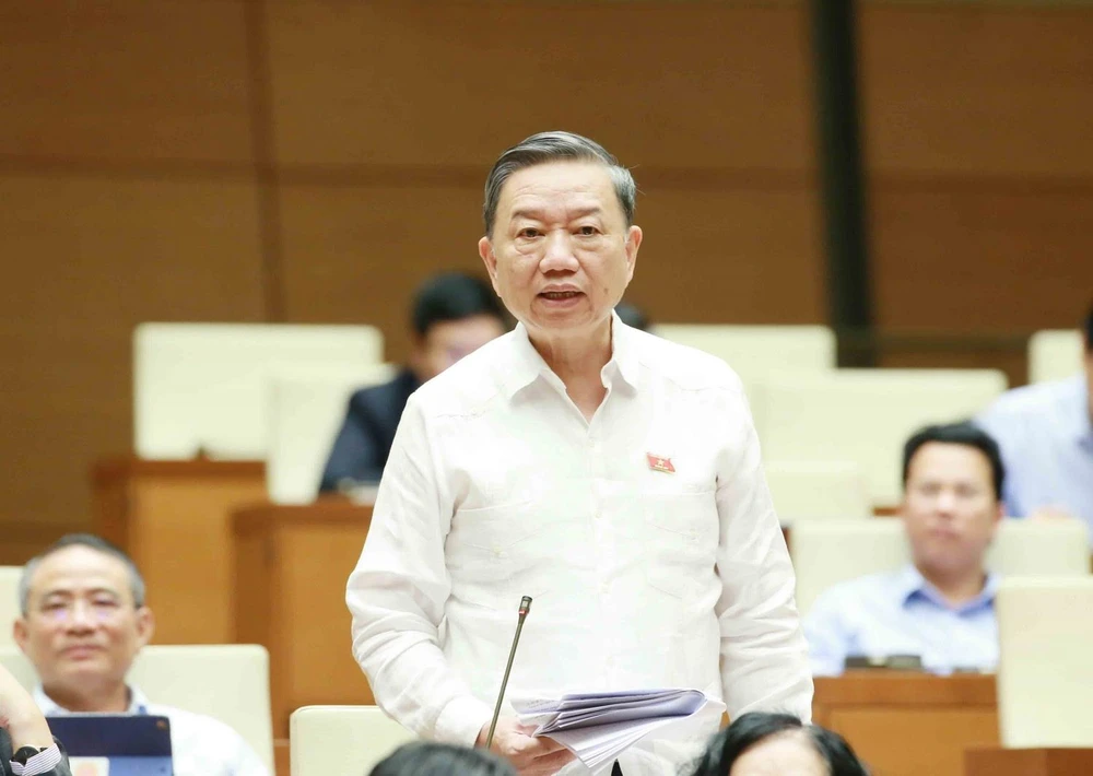 Đại tướng Tô Lâm, Bộ trưởng Bộ Công an trả lời chất vấn của đại biểu Quốc hội. (Ảnh: Phương Hoa/TTXVN)