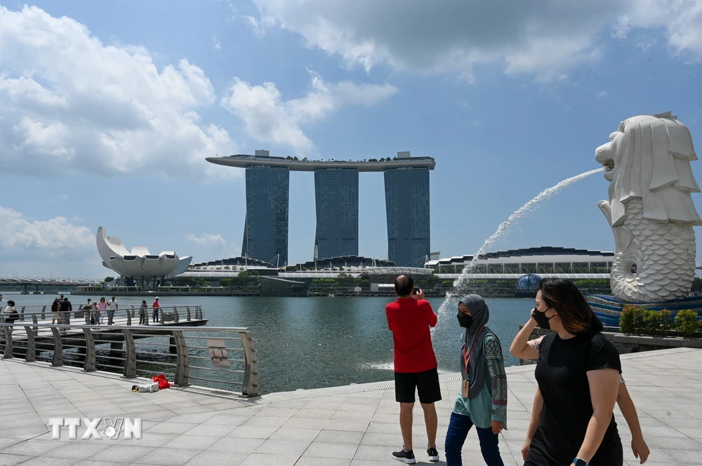 Khách du lịch tại Singapore. (Ảnh: AFP/TTXVN)