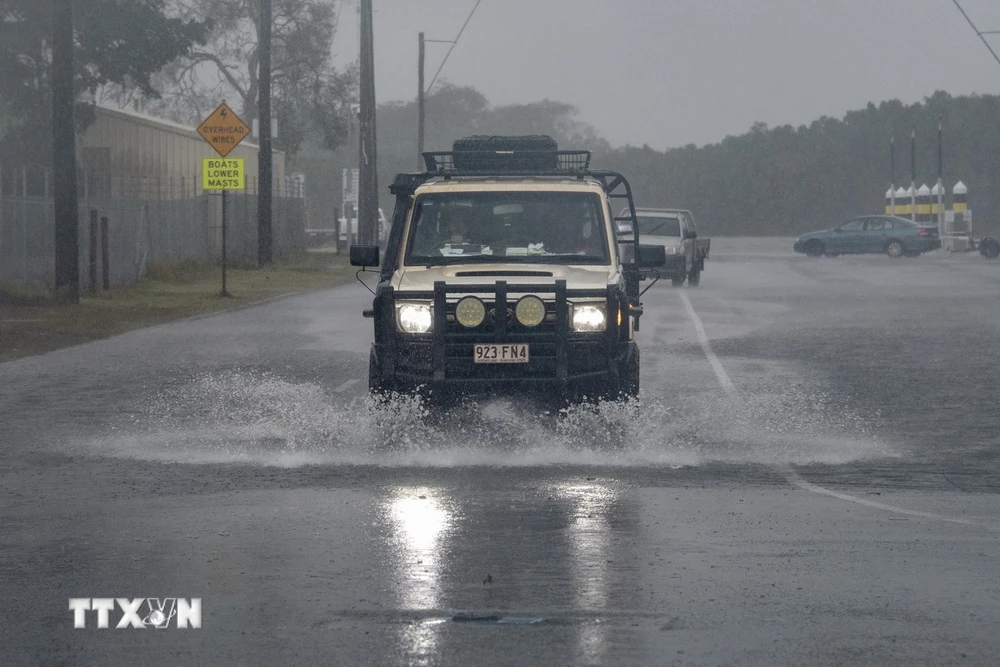 Ngập lụt do ảnh hưởng của bão Jasper tại bang Queensland, Australia. (Ảnh: AFP/TTXVN)