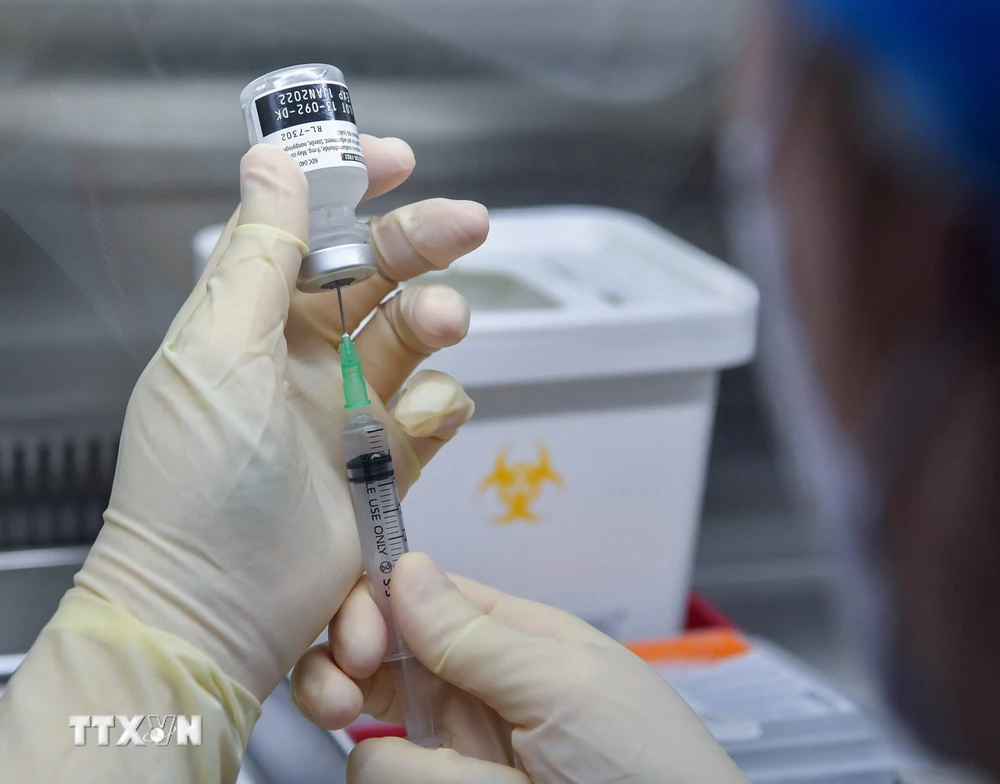 Vaccine phòng COVID-19 của Pfizer và BioNTech. (Ảnh: AFP/TTXVN)