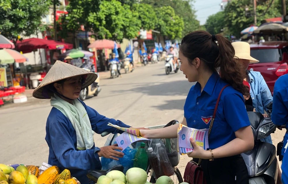 Tuyên truyền về chính sách bảo hiểm xã hội tự nguyện. (Ảnh: PV/Vietnam+)