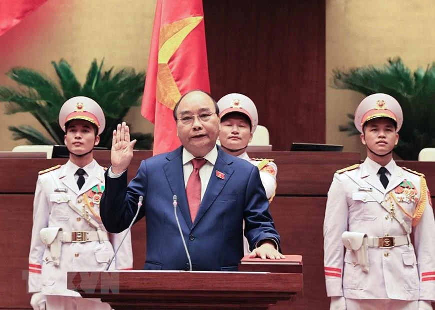 Chủ tịch nước Nguyễn Xuân Phúc tuyên thệ nhậm chức trước Quốc hội, đồng bào và cử tri cả nước. (Ảnh: Thống Nhất/TTXVN)