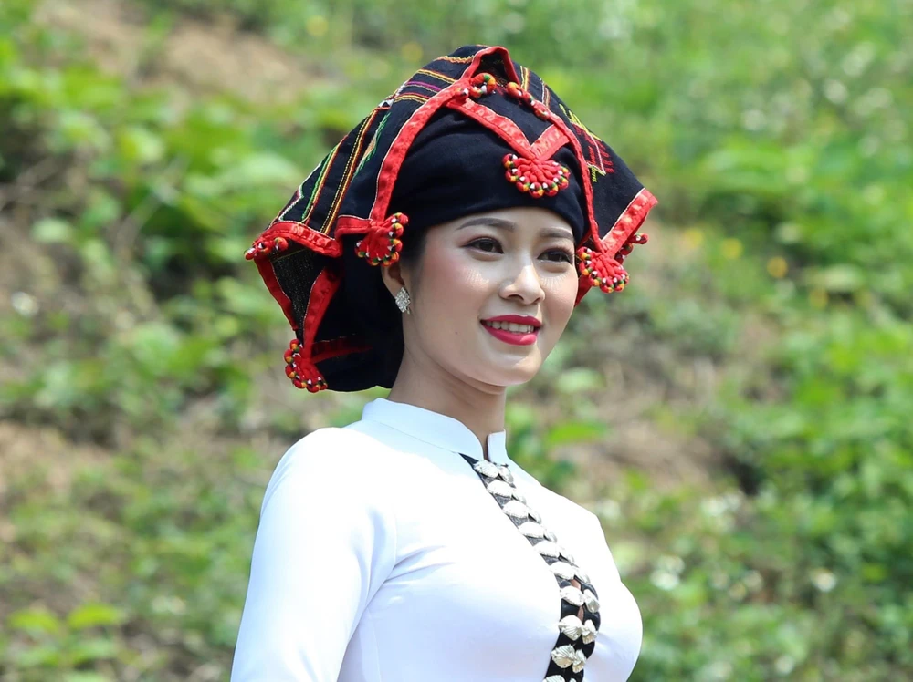 Vẻ đẹp của phụ nữ Thái khi mặc trang phục truyền thống của dân tộc. (Ảnh: Phan Tuấn Anh/TTXVN)
