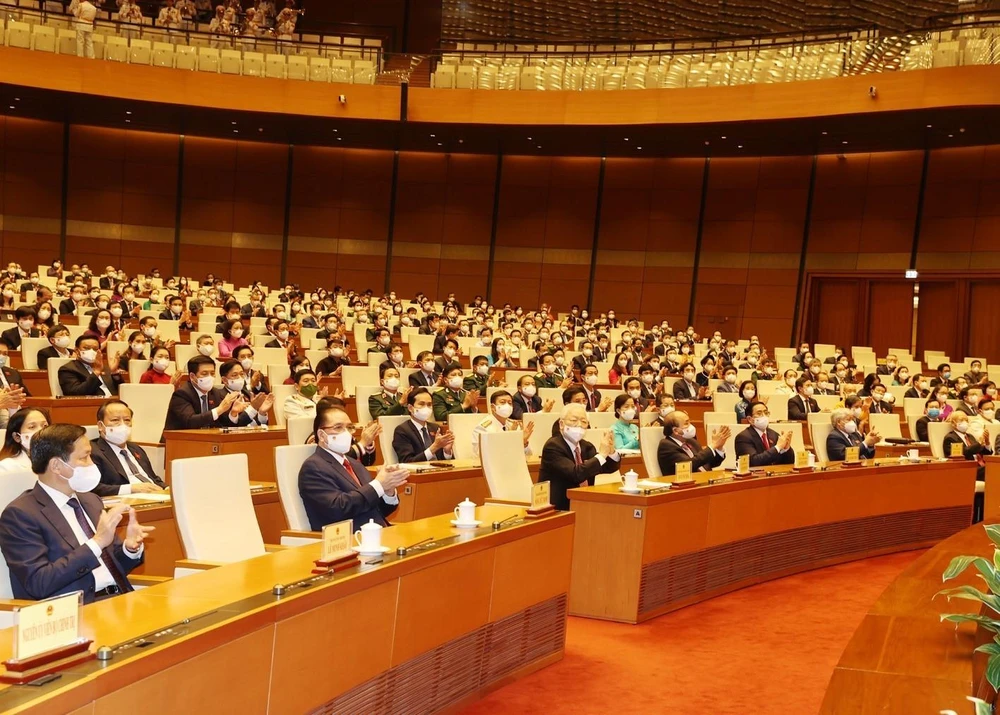 Các đồng chí lãnh đạo, nguyên lãnh đạo Đảng, Nhà nước cùng các đại biểu dự bế mạc kỳ họp thứ nhất, Quốc hội khóa XV. (Ảnh: Trí Dũng/TTXVN)