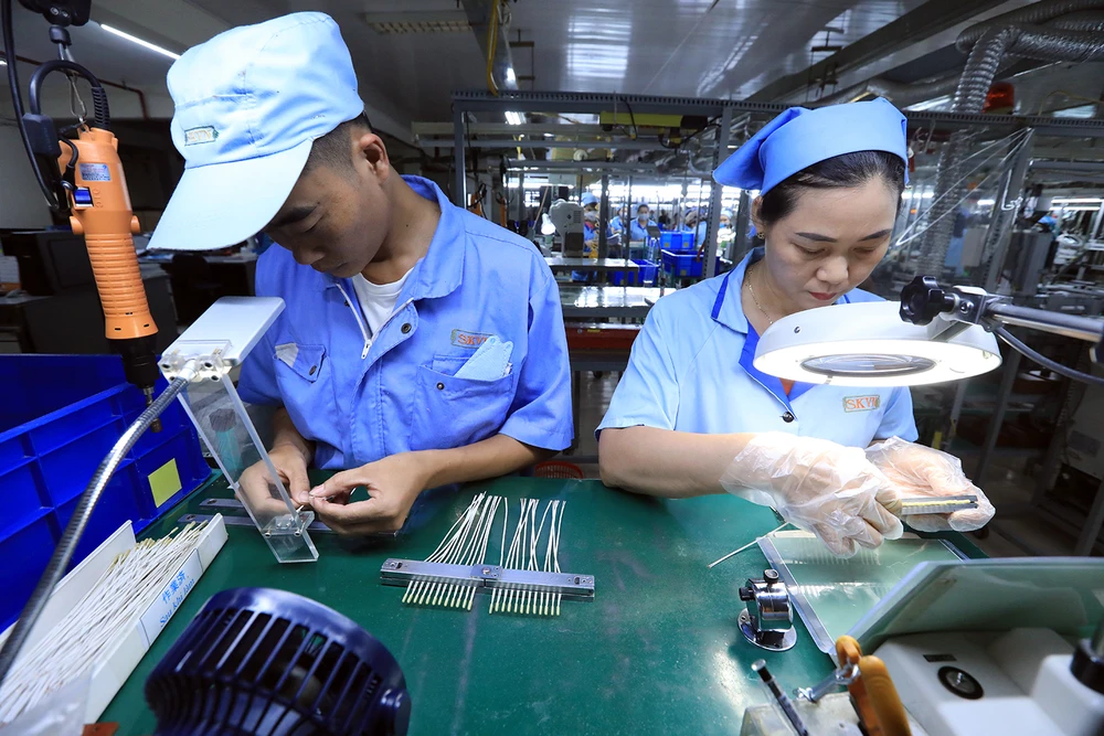 Các doanh nghiệp đẩy mạnh sản xuất Xanh, tham gia sâu vào chuỗi cung ứng. (Ảnh: Đức Duy/Vietnam+)