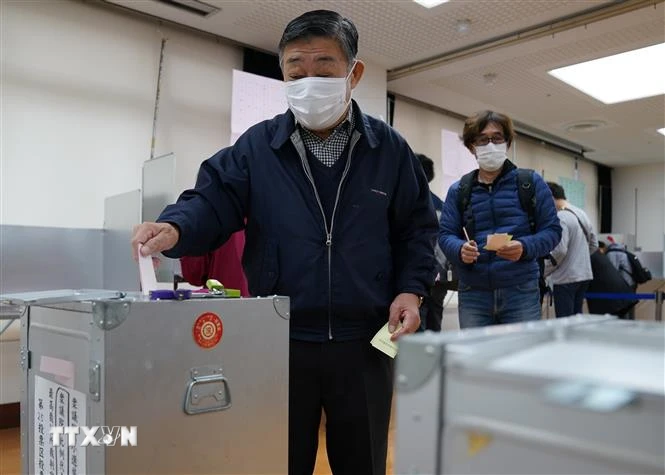 日本の衆議院選挙: 有権者は政治の安定を選択 写真 2