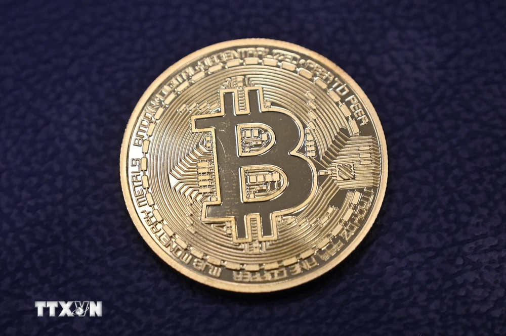 Đồng tiền kỹ thuật số Bitcoin. (Ảnh: AFP/TTXVN)