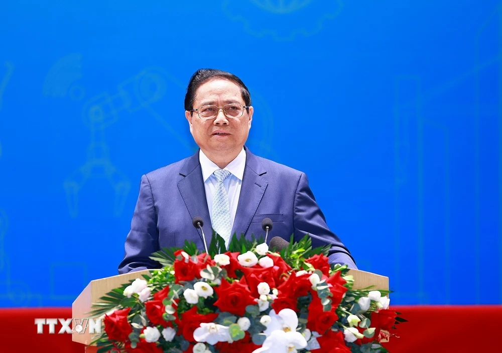 Thủ tướng Phạm Minh Chính phát biểu tại Diễn đàn Nâng cao Năng suất Lao động Quốc gia năm 2024. (Ảnh: Dương Giang/TTXVN)