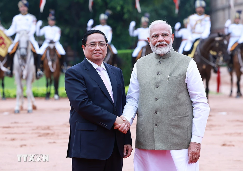 ​Thủ tướng Narendra Modi đón Thủ tướng Phạm Minh Chính​ thăm cấp Nhà nước đến Ấn Độ. (Ảnh: Dương Giang/TTXVN)