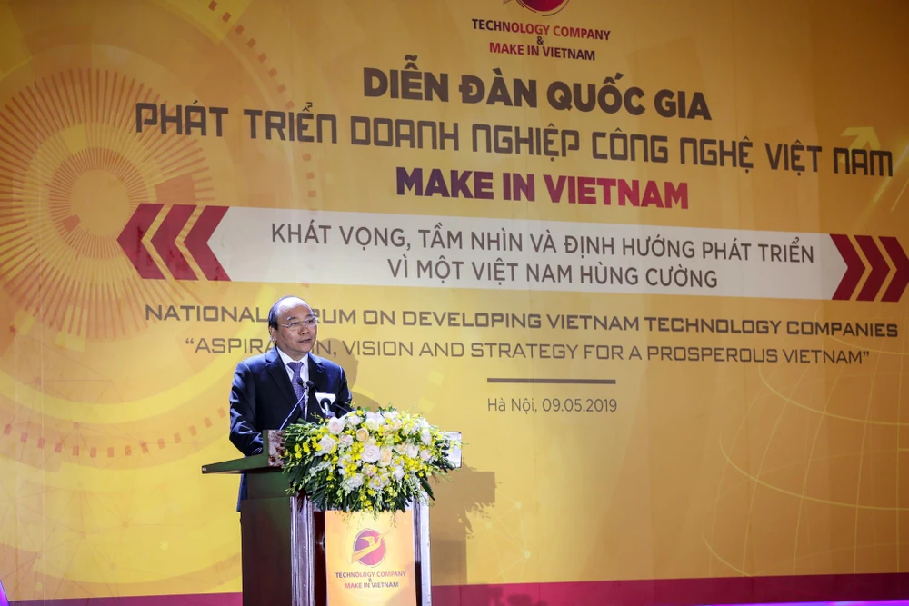 Thủ tướng Nguyễn Xuân Phúc phát biểu tại Diễn đàn quốc gia phát triển doanh nghiệp công nghệ Việt Nam. (Ảnh: Minh Sơn/Vietnam+)