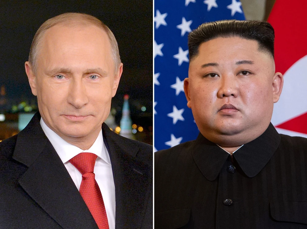 Tổng thống Nga Vladimir Putin (trái) và Nhà lãnh đạo Triều Tiên Kim Jong-un. (Nguồn: AFP/TTXVN)