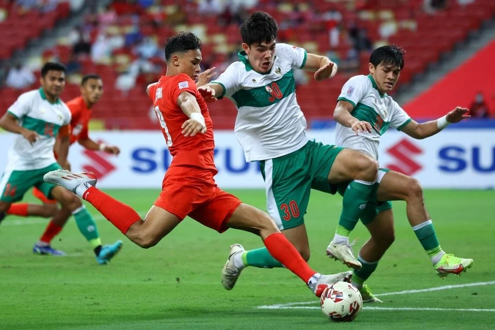 Đội tuyển Indonesia và Singapore bất phân thắng bại ở bán kết lượt đi AFF Cup 2020. (Ảnh: Getty Images) 