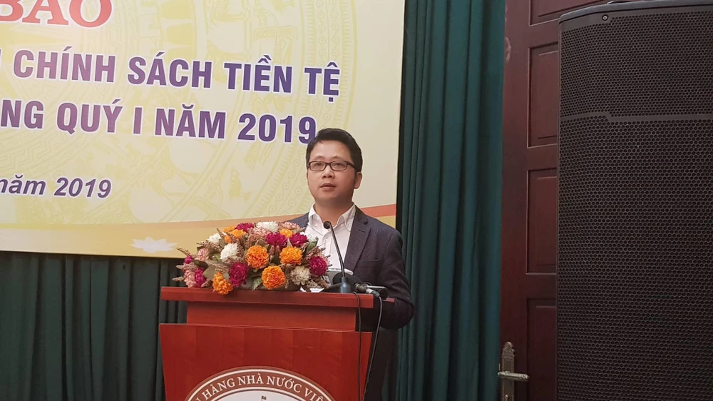 Ông Nghiêm Thanh Sơn, Phó vụ trưởng Vụ Thanh toán phát biểu tại họp báo. (Ảnh: TH/Vietnam+)