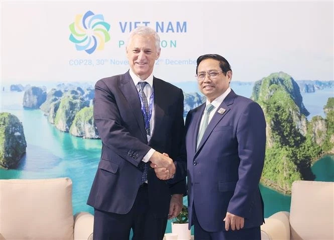 Ông Bill Winters - Tổng giám đốc Ngân hàng Standard Chartered tiếp Thủ tướng Chính phủ Phạm Minh Chính. (Ảnh: CTV/Vietnam+)