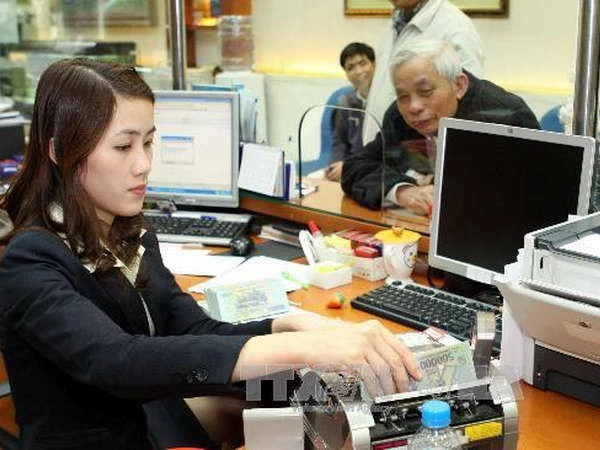 Sacombank triển khai gói tài khoản an sinh xã hội miễn phí. (Ảnh: Vietnam+)