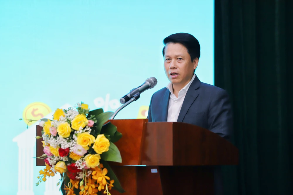 Ông Phạm Tiến Dũng - Phó Thống đốc Ngân hàng Nhà nước phát biểu tại hội thảo. (Ảnh: Vietnam+)