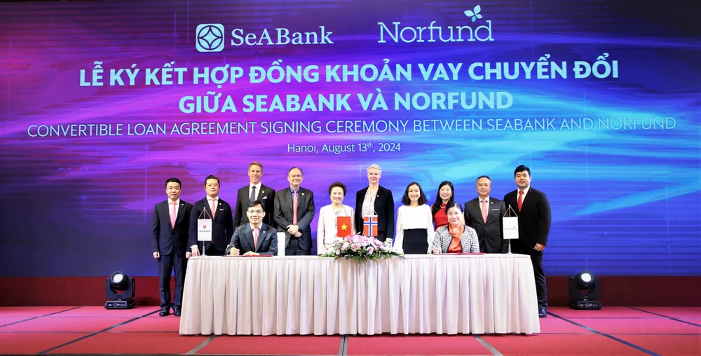 SeABank và Norfund ký kết hợp đồng khoản vay chuyển đổi trị giá 30 triệu USD. (Ảnh: Vietnam+)