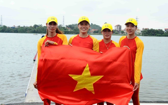 vna_potal_dua_thuyen_sea_games_31_viet_nam_doat_hvc_noi_dung_4_nu_hang_nang_cheo_doi_6099988.jpg