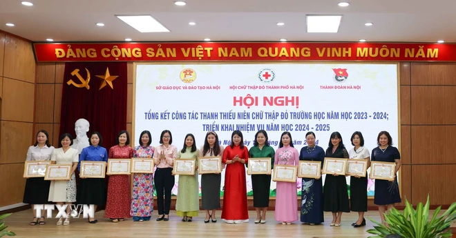 ttxvn_cuu tro nhan dao truong hoc Ha Noi.jpg