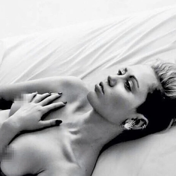Miley Cyrus posted topless photos again to "liberate her nipples" photo 1
