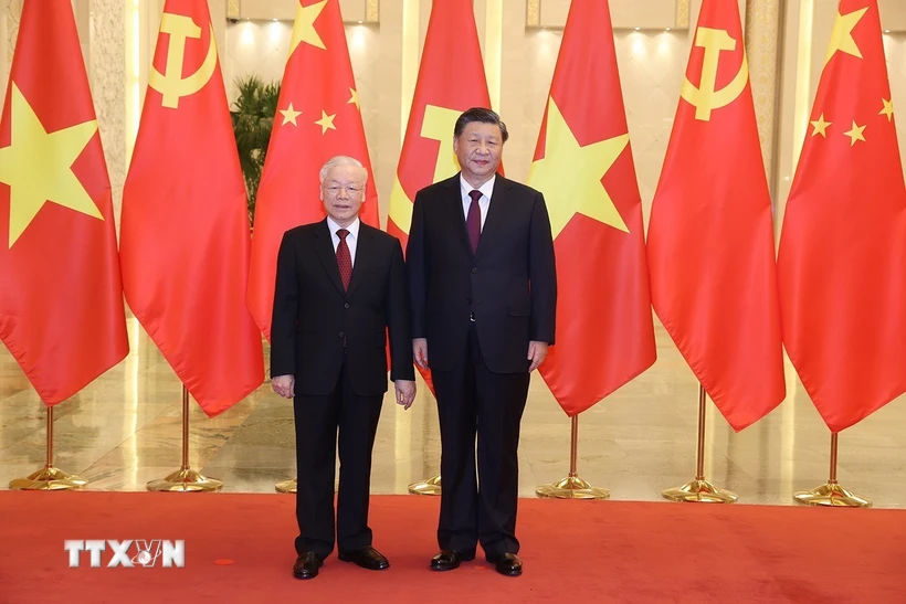 Tổng Bí thư Nguyễn Phú Trọng và Tổng Bí thư, Chủ tịch Trung Quốc Tập Cận Bình chụp ảnh chung. (Ảnh: Trí Dũng/TTXVN)