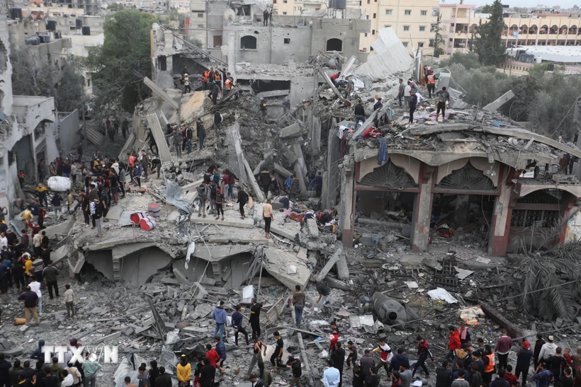 Cảnh đổ nát sau các cuộc oanh tạc của Israel xuống thành phố Rafah, miền Nam Dải Gaza, ngày 22/11/2023. (Ảnh: THX/TTXVN)