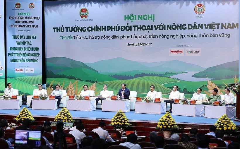 Thủ tướng Chính phủ Phạm Minh Chính đối thoại với nông dân Việt Nam năm 2022. (Ảnh: Dương Giang: TTXVN)