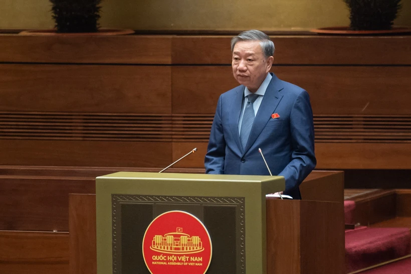 Bộ trưởng Bộ Công An Tô Lâm trình bày báo cáo trước Quốc hội. (Ảnh: CTV/Vietnam+)