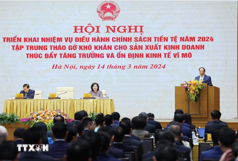 Thủ tướng Phạm Minh Chính phát biểu chỉ đạo Hội nghị triển khai nhiệm vụ điều hành chính sách tiền tệ năm 2024. (Ảnh: Dương Giang/TTXVN)